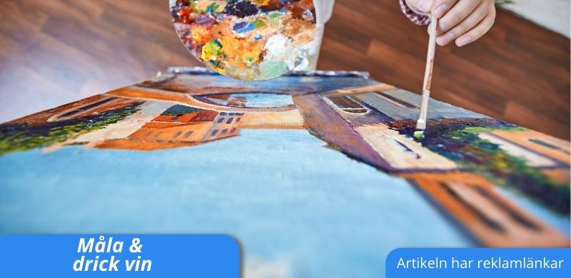 Person som målar tavla samt texten Måla och drick vin